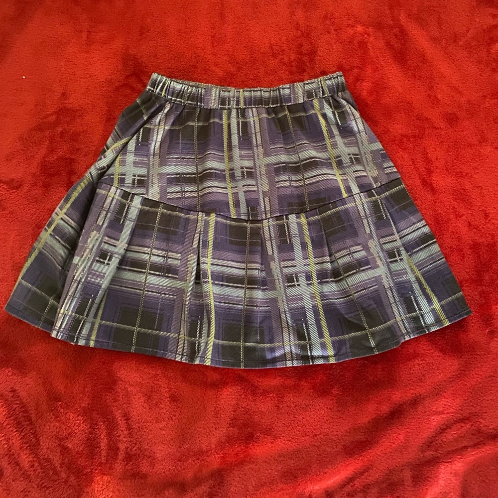| Kids Purple skirt | Size: 13/14 |